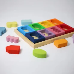 Bauspiel Fenster | 16 bunte Holzteile im Holzrahmen