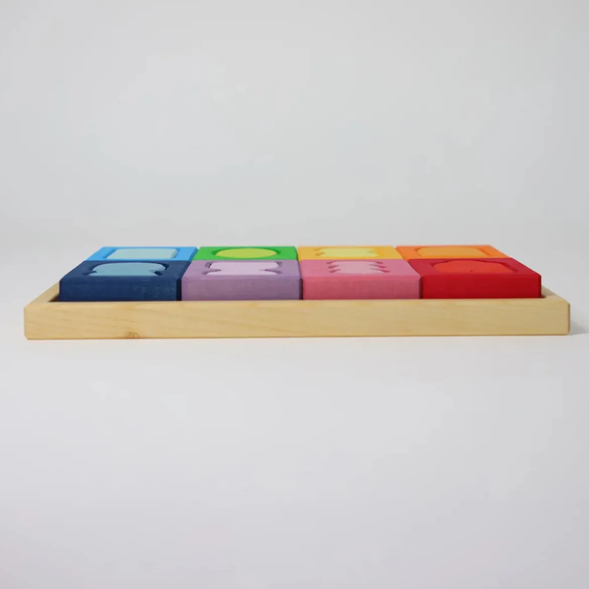 Bauspiel Fenster | 16 bunte Holzteile im Holzrahmen