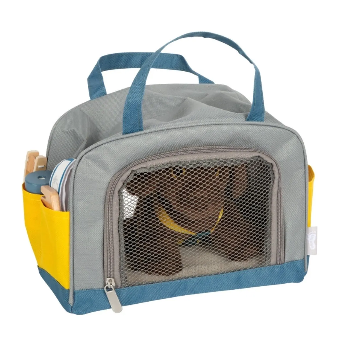 Hund mit Tasche und Pflege-Set